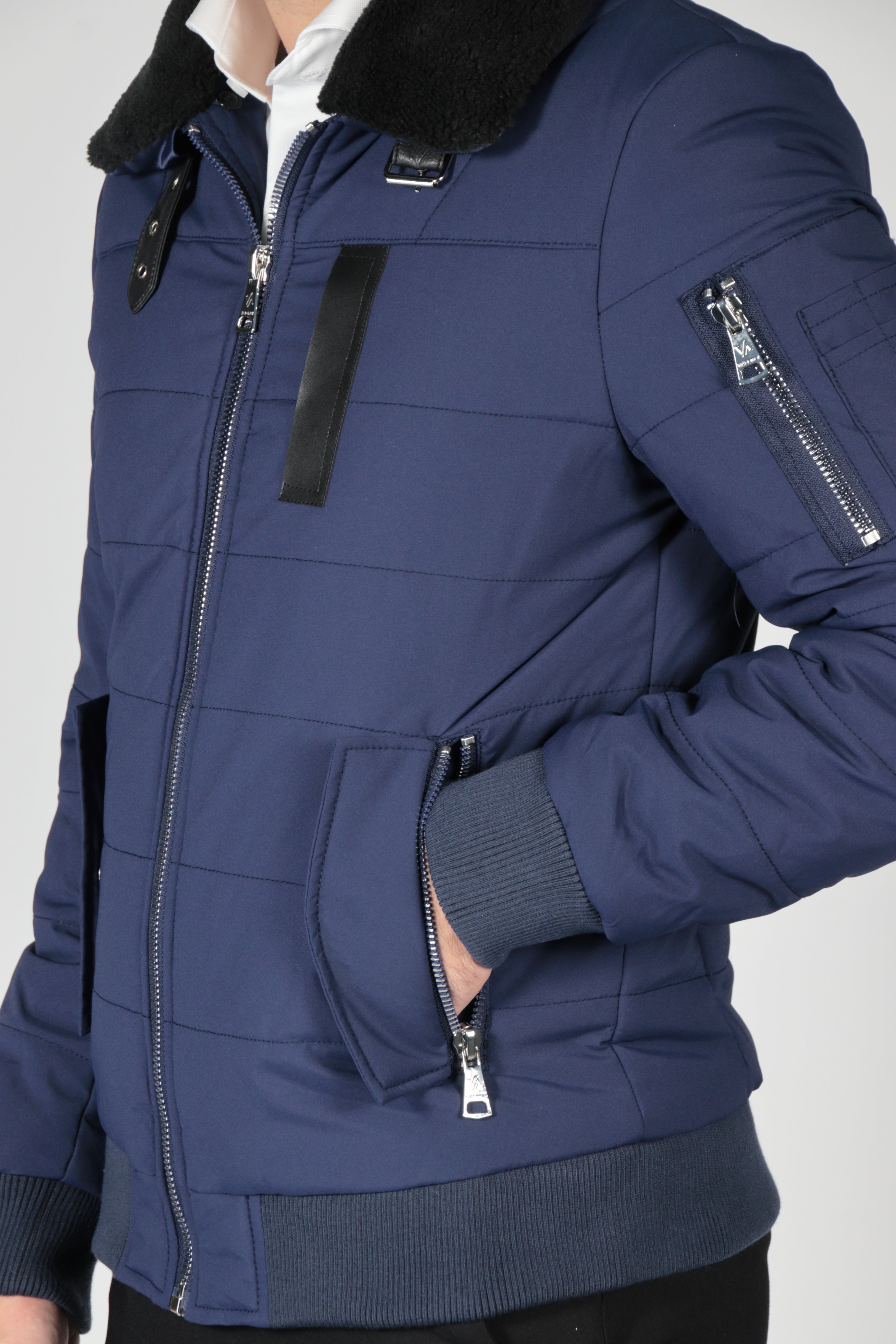 Blue bomber jacket with black collar