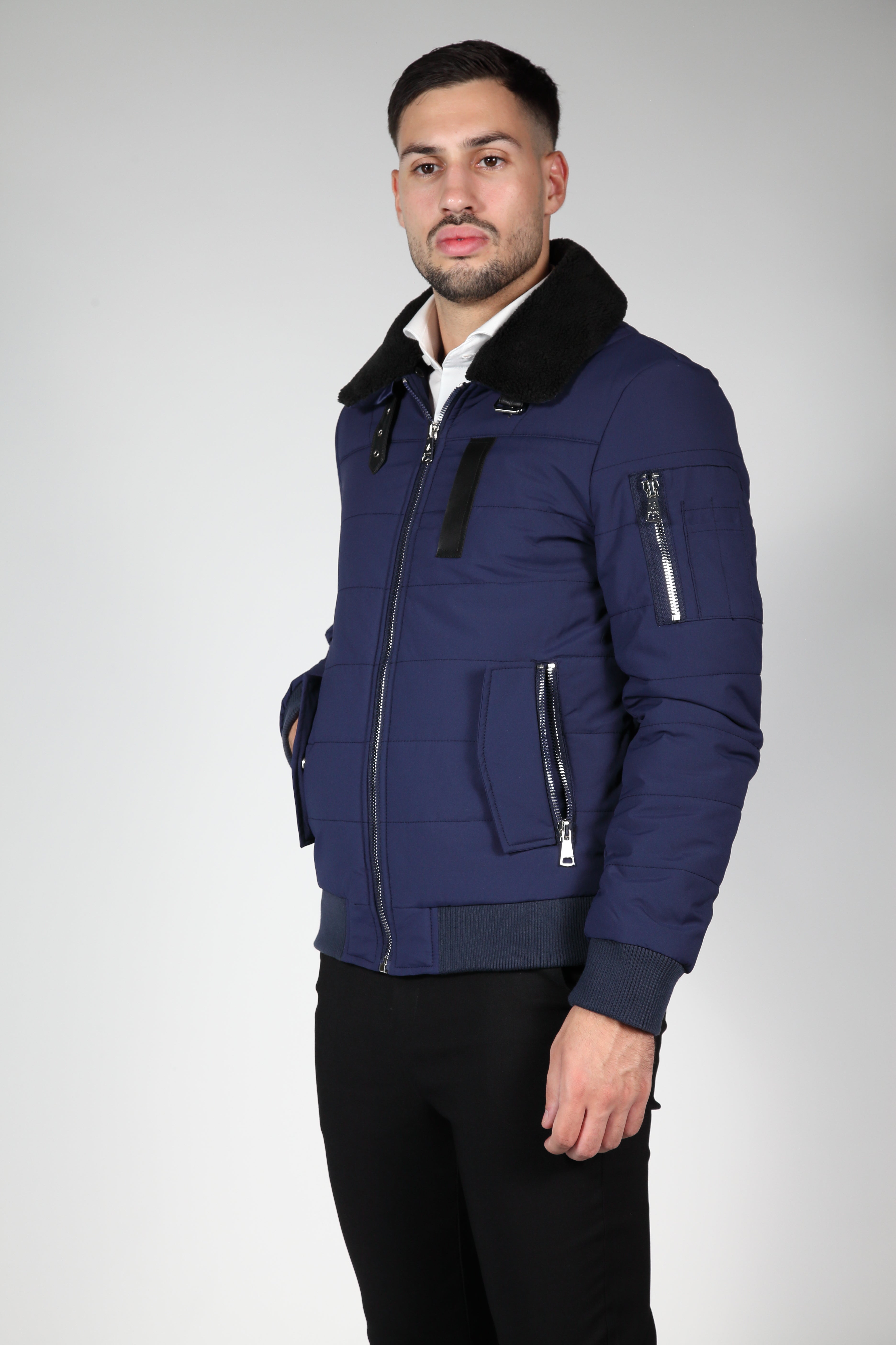 Blue bomber jacket with black collar