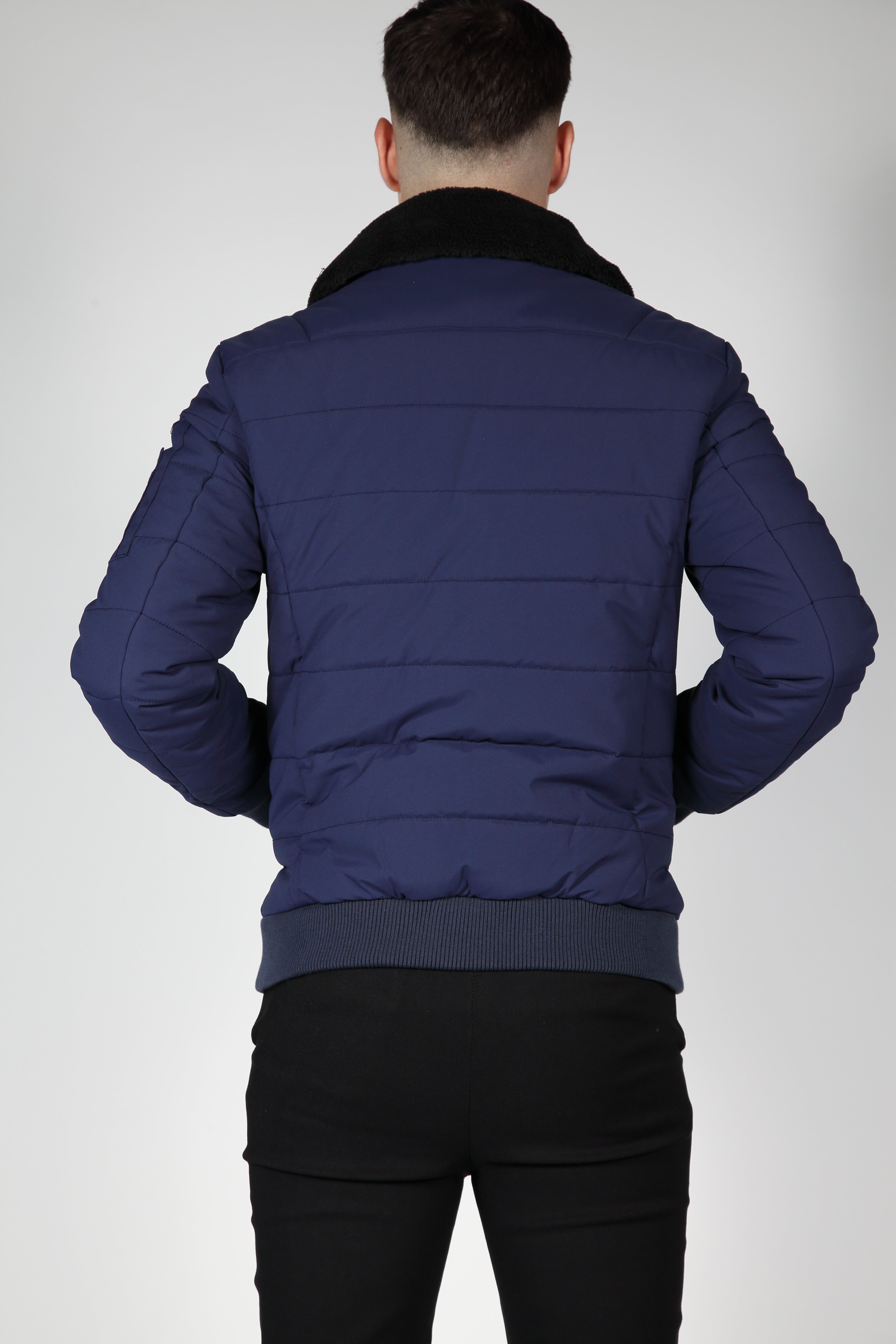 Blue bomber jacket with black collar