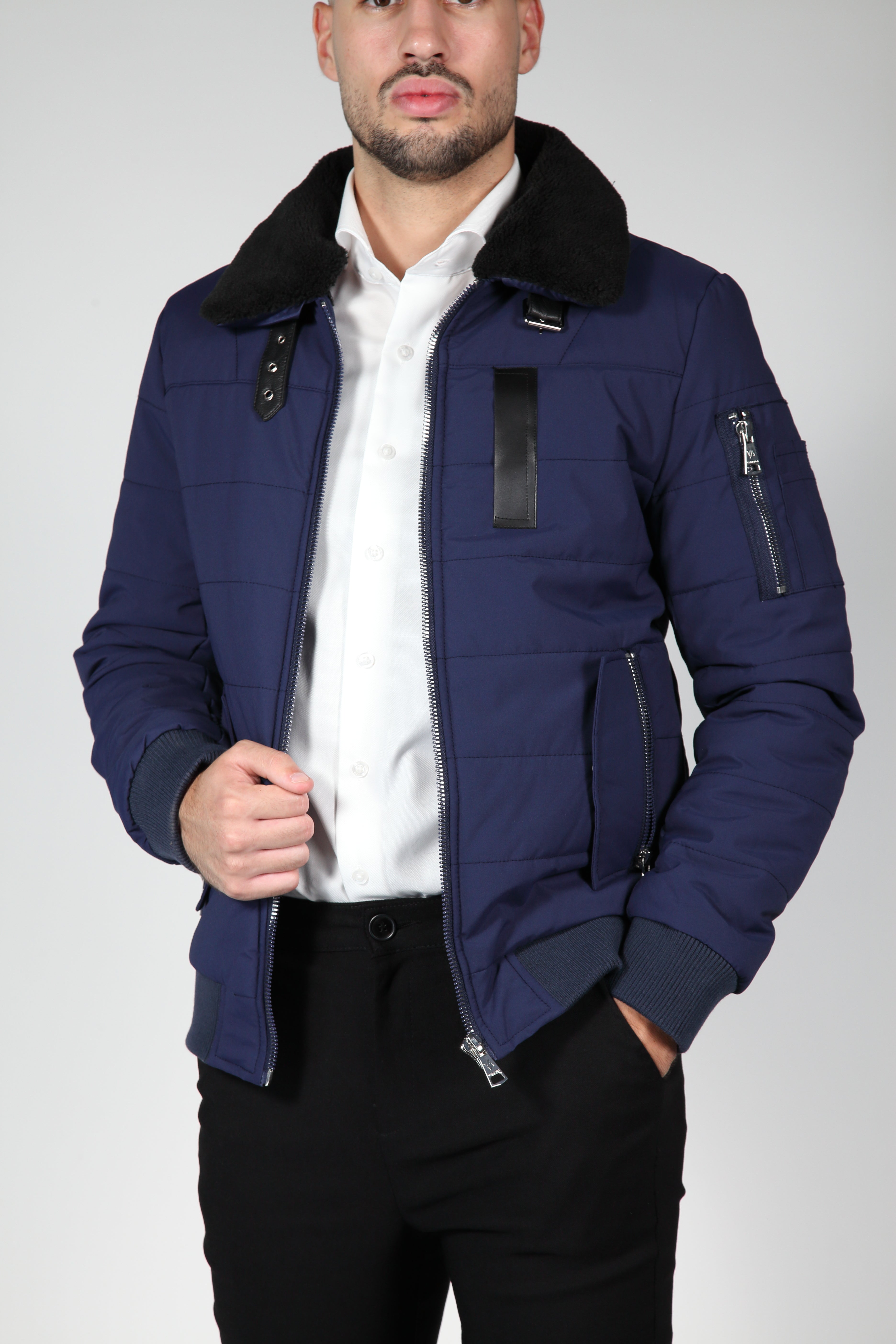 Blue bomber jacket with black collar